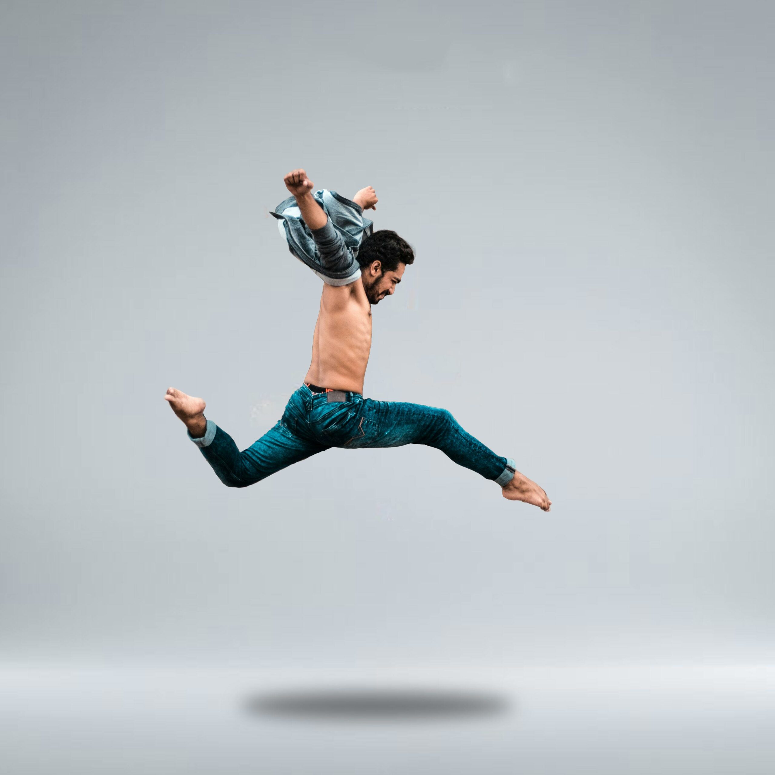 flexible man jumping in the air